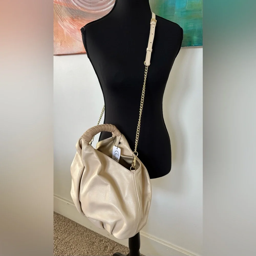NWT gorgeous gold leather handbag. Detachable shoulder strap. Gold and beige